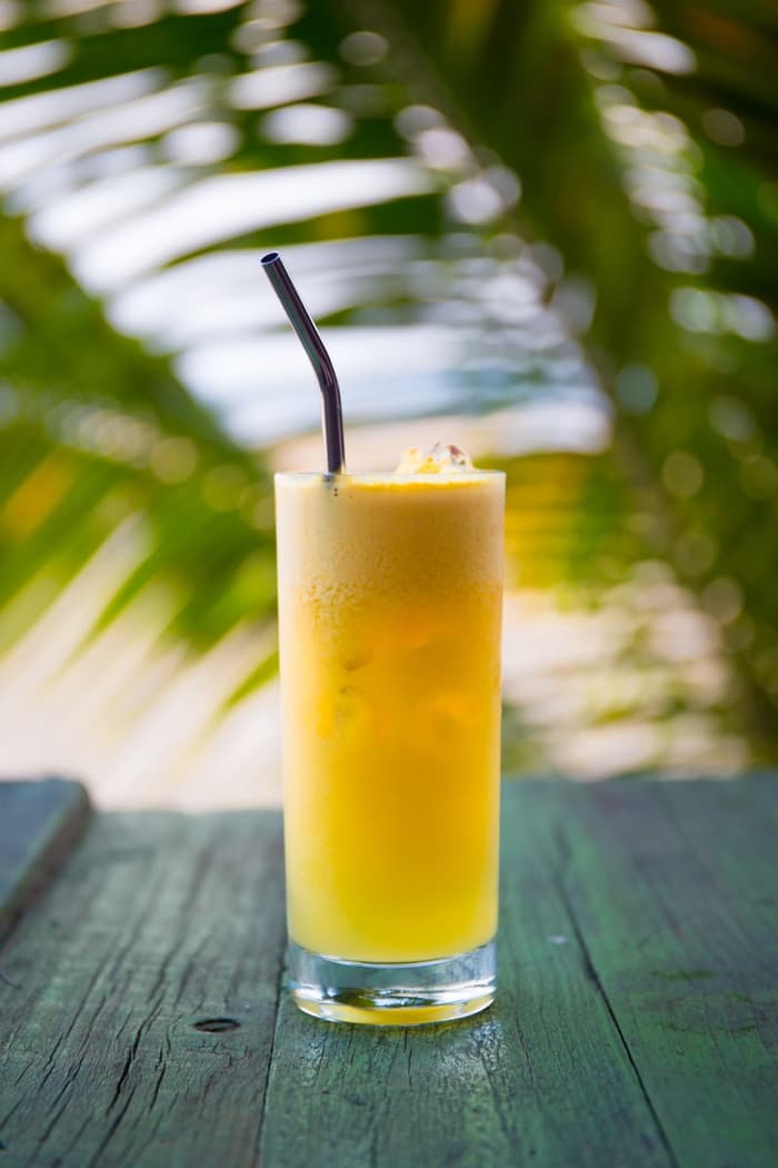 Fresh tropical juice on a coastal table
